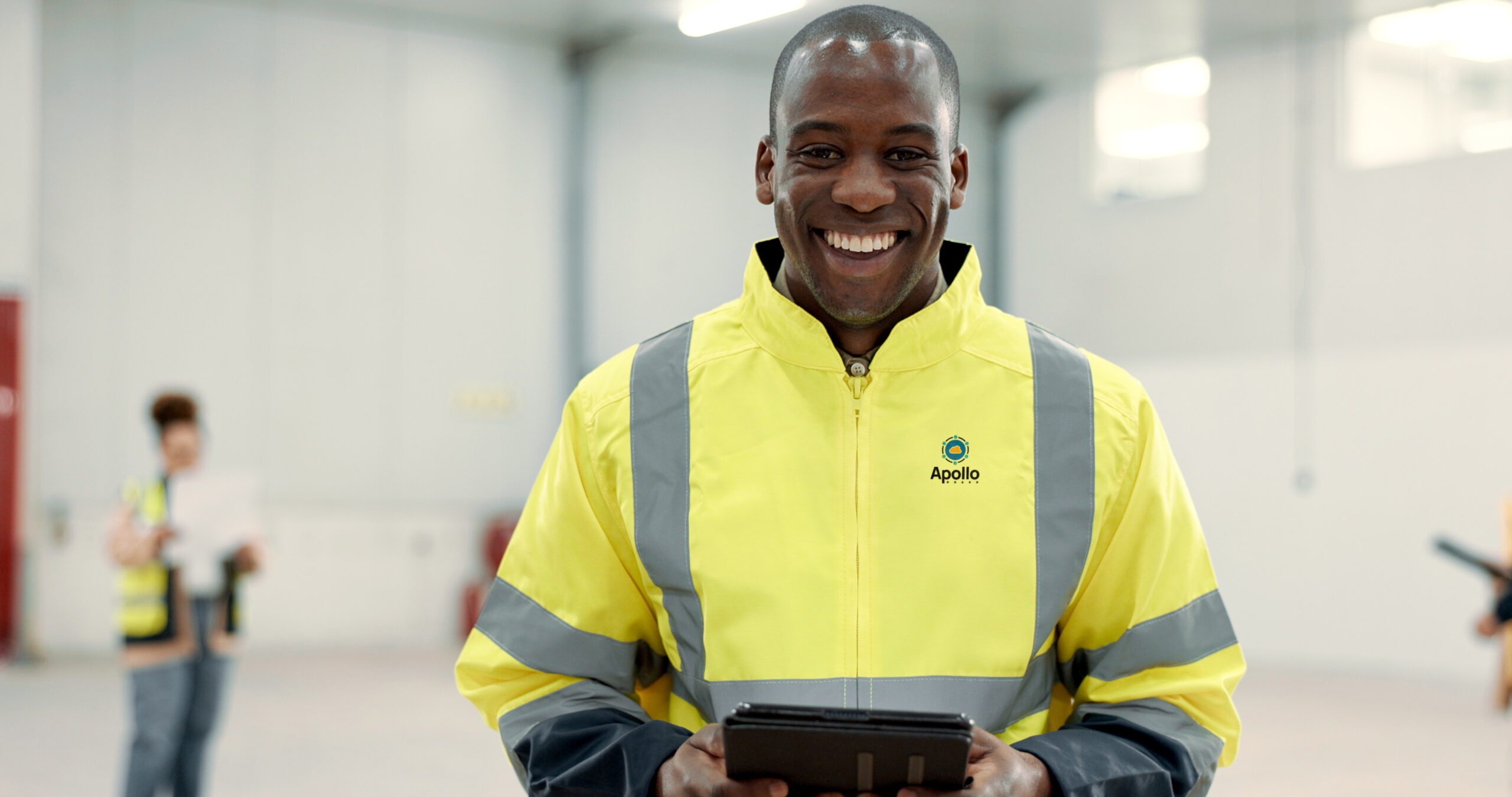 Male engineer with tablet for data center inspection.