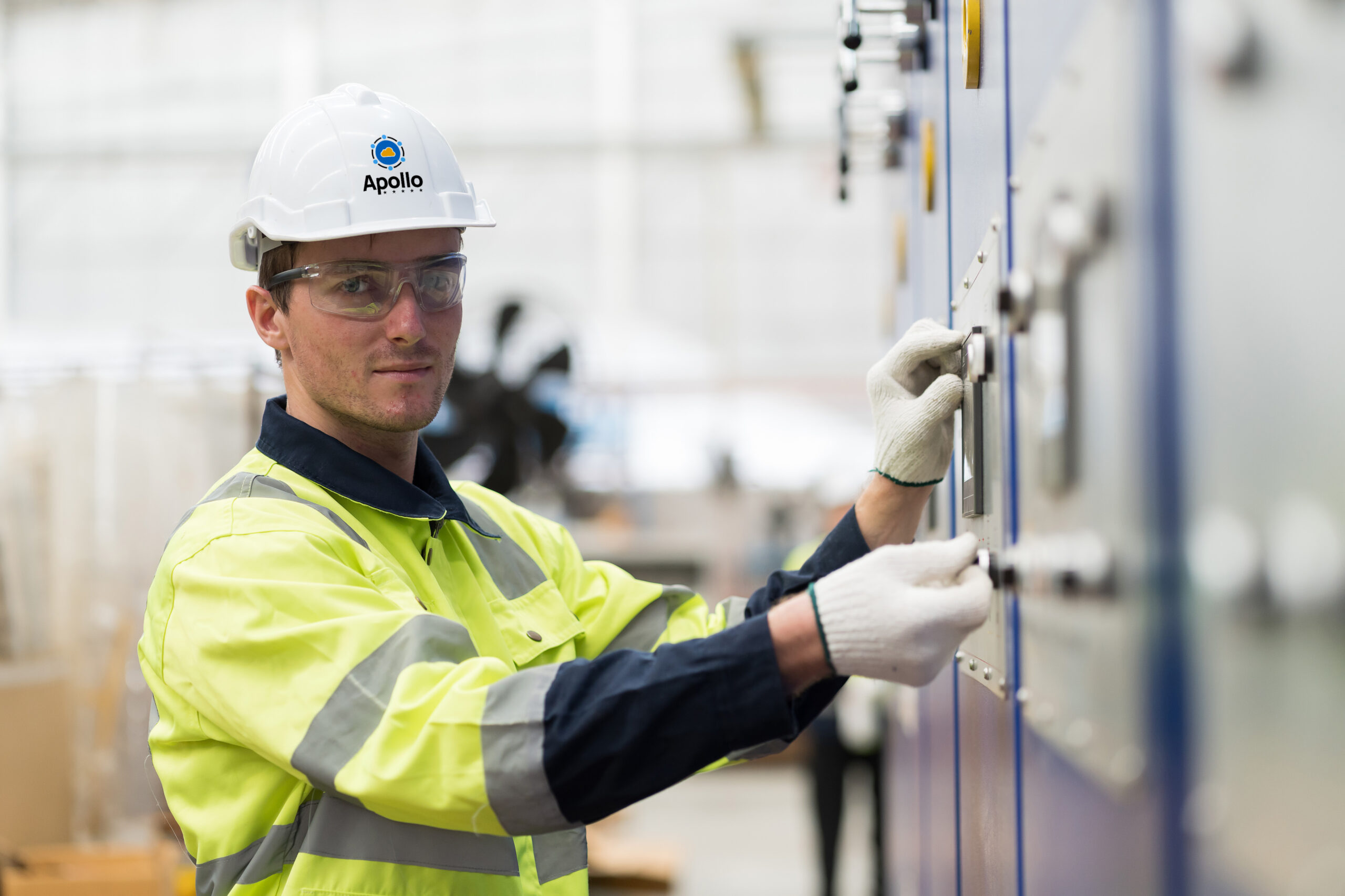 Male and female engineer reviewing project at a data center construction site.